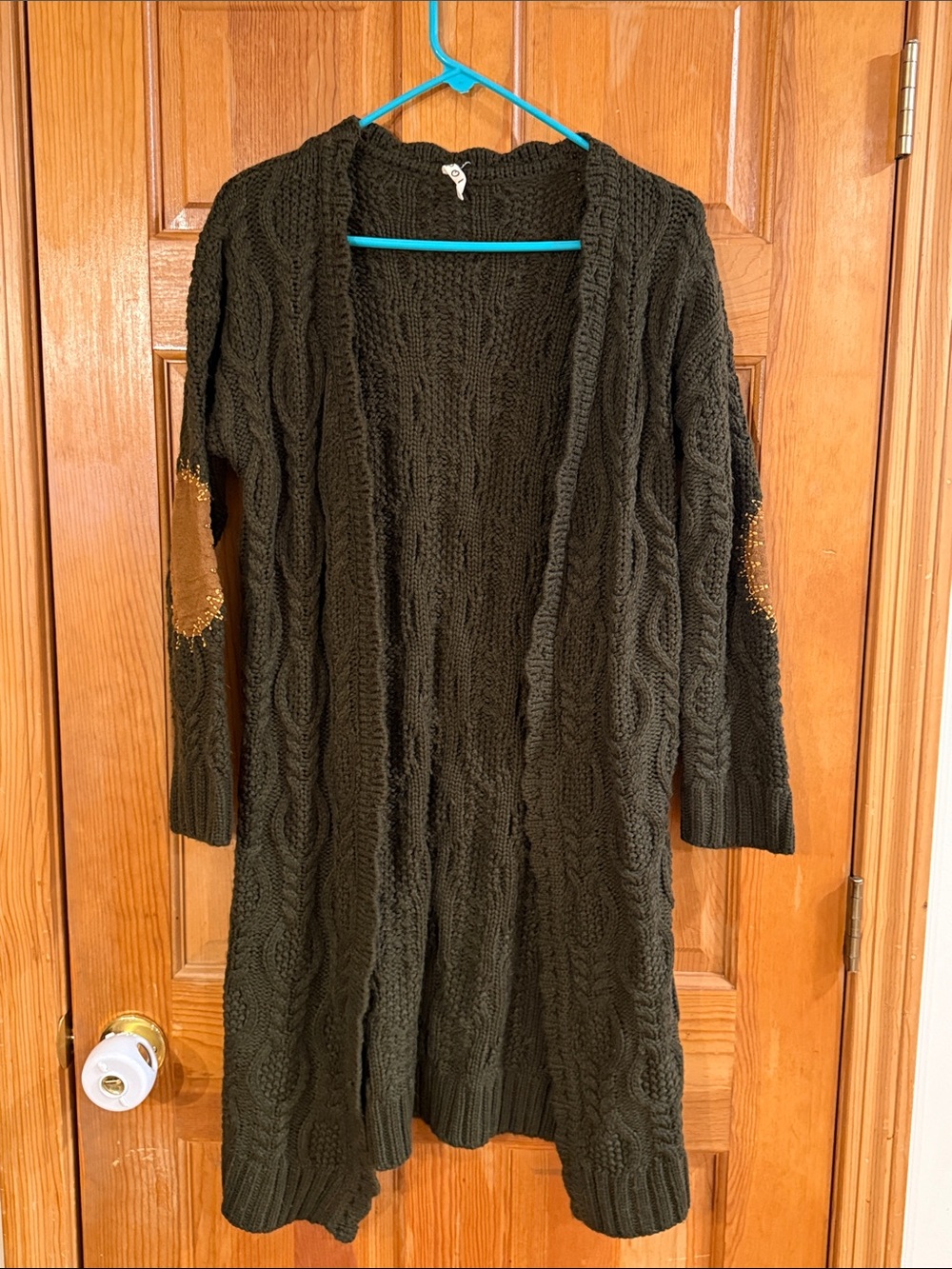 Pol green knit sweater with arm patches size small .